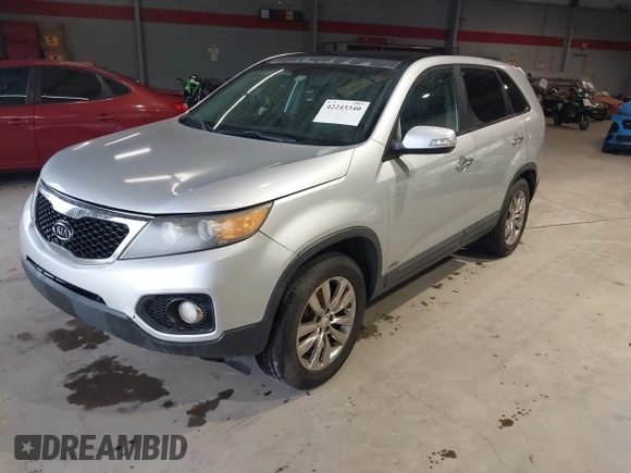 2011 Kia Sorento EX with VIN 5XYKUDA21BG024857, listed as a IAAI auction lot 42243340 with 145,514 mi miles and . Bid and sale history available at DreamBid. Image 2.