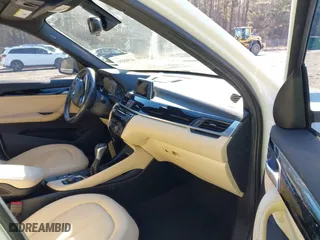 2017 BMW X1 xDrive28i with VIN WBXHT3C37H5F69725, listed as a IAAI auction lot 41588095 with 109,704 mi miles. Bid and sale history available at carsss.com. Image 5.