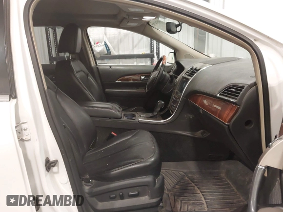 2011 Lincoln MKX with VIN 2LMDJ8JK8BBJ34012, listed as a IAAI auction lot 41524792 with 142,670 mi miles. Bid and sale history available at carsss.com. Image 5.
