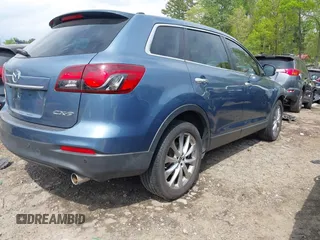 2014 Mazda CX-9 Grand Touring with VIN JM3TB2DA7E0427423, listed as a IAAI auction lot 42006817 with 95,248 mi miles and . Bid and sale history available at DreamBid. Image 4.