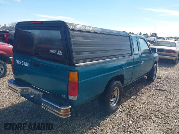 1997 Nissan Frontier XE z VIN 1N6SD16S8VC414870, wystawiony jako IAAI lot #41830303 z przebiegiem 103 158 mil mil oraz . Historia ofert i sprzedaży dostępna na DreamBid. Obrazek 4.