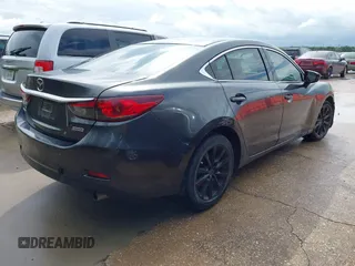 2014 Mazda 6 i Sport with VIN JM1GJ1U66E1129233, listed as a IAAI auction lot 42045330 with 195,071 mi miles and . Bid and sale history available at carsss.com. Image 4.