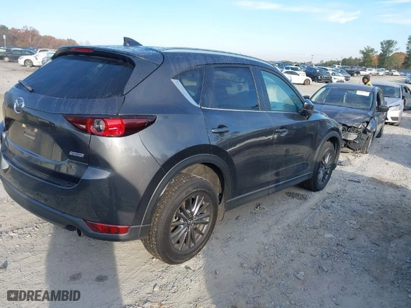 2019 Mazda CX-5 Touring with VIN JM3KFACM9K1522383, listed as a IAAI auction lot 40930431 with NaN miles. Bid and sale history available at carsss.com. Image 4.