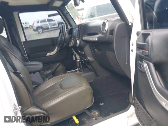 2017 Jeep Wrangler Unlimited Sahara with VIN 1C4BJWEG3HL752719, listed as a IAAI auction lot 41892600 with 127,486 mi miles. Bid and sale history available at carsss.com. Image 5.
