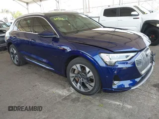 2021 Audi e-tron Premium Plus with VIN WA1LAAGE4MB038563, listed as a IAAI auction lot 42422063 with 31,645 mi miles and . Bid and sale history available at DreamBid. Image 1.