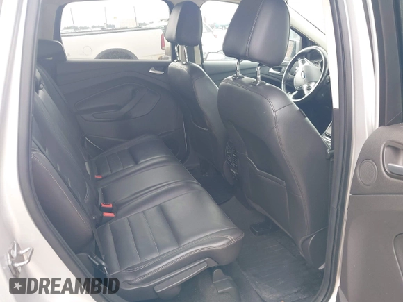 2016 Ford Escape Titanium with VIN 1FMCU9JX3GUC86930, listed as a IAAI auction lot 42582263 with 113,386 mi miles and . Bid and sale history available at DreamBid. Image 8.