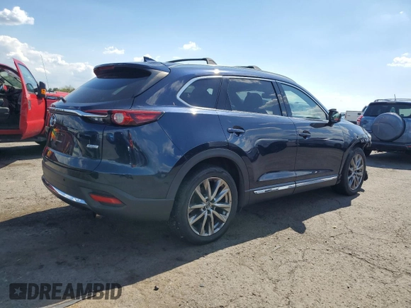 2017 Mazda CX-9 Grand Touring z VIN JM3TCBDY8H0131941, wystawiony jako Copart lot #56199685 z przebiegiem 166 080 mil mil oraz Szkoda całkowita • Salvage title. Historia ofert i sprzedaży dostępna na DreamBid. Obrazek 3.