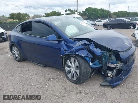 2022 Tesla Model Y Long Range z VIN 7SAYGDEE9NA002493, wystawiony jako IAAI lot #41756460 z przebiegiem 68 315 mil mil oraz . Historia ofert i sprzedaży dostępna na DreamBid. Obrazek 1.