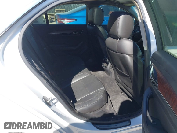 2016 Cadillac CTS with VIN 1G6AR5SS1G0112728, listed as a IAAI auction lot 41830547 with 100,610 mi miles and . Bid and sale history available at DreamBid. Image 8.
