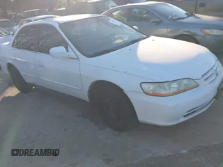 2002 Honda Accord LX z VIN 1HGCG56492A142622, wystawiony jako IAAI lot #41280261 z przebiegiem 233 144 mil mil oraz . Historia ofert i sprzedaży dostępna na DreamBid. Obrazek 1.