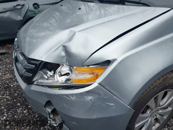 2016 Honda Odyssey EX-L with VIN 5FNRL5H61GB147766, listed as a IAAI auction lot 41822141 with 105,261 mi miles and . Bid and sale history available at DreamBid. Image 6.