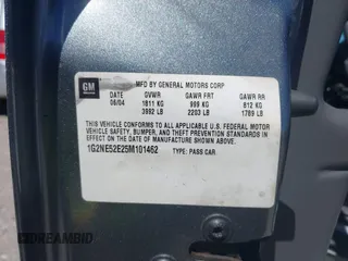 2005 Pontiac Grand Am SE with VIN 1G2NE52E25M101462, listed as a IAAI auction lot 41743136 with 77,376 mi miles. Bid and sale history available at carsss.com. Image 9.