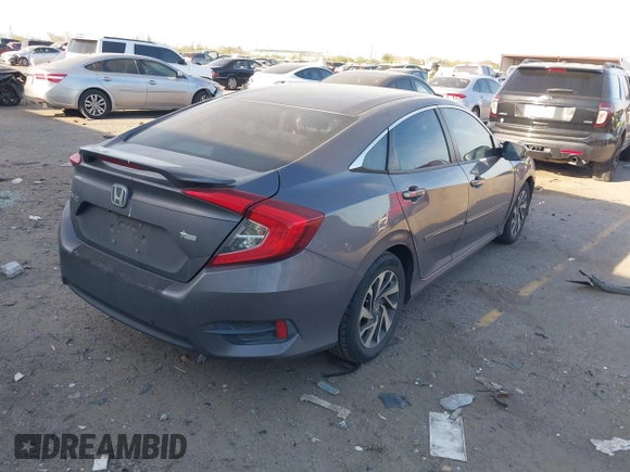 2016 Honda Civic Sedan EX with VIN 19XFC2F74GE064349, listed as a IAAI auction lot 41810683 with 129,817 mi miles. Bid and sale history available at carsss.com. Image 4.