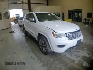 2017 Jeep Grand Cherokee Overland with VIN 1C4RJECG9HC916342, listed as a Copart auction lot 60658285 with 59,470 mi miles and Salvage title. Bid and sale history available at DreamBid. Image 13.