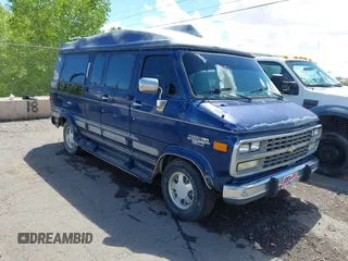 1995 Chevrolet Chevy Van z VIN 1GBEG25K2SF195644, wystawiony jako IAAI lot #42207878 z przebiegiem 202 557 mil mil oraz . Historia ofert i sprzedaży dostępna na DreamBid. Obrazek 1.
