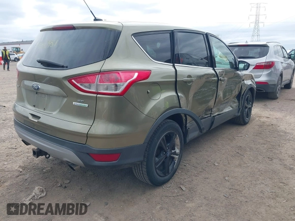2013 Ford Escape SE with VIN 1FMCU0G90DUA41793, listed as a IAAI auction lot 41842981 with 179,312 mi miles. Bid and sale history available at carsss.com. Image 4.