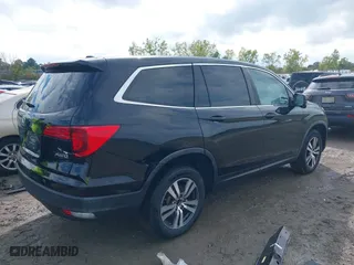 2016 Honda Pilot EX-L with VIN 5FNYF6H5XGB031594, listed as a IAAI auction lot 40409867 with 132,227 mi miles. Bid and sale history available at carsss.com. Image 4.