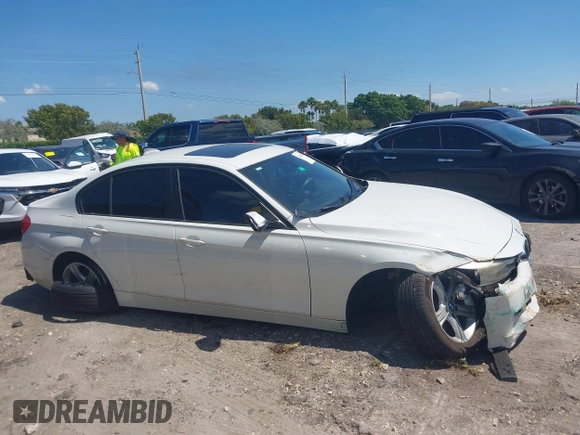 2014 BMW 3 Series 320i with VIN WBA3B1C51EK131063, listed as a IAAI auction lot 42043086 with 92,306 mi miles. Bid and sale history available at carsss.com. Image 13.