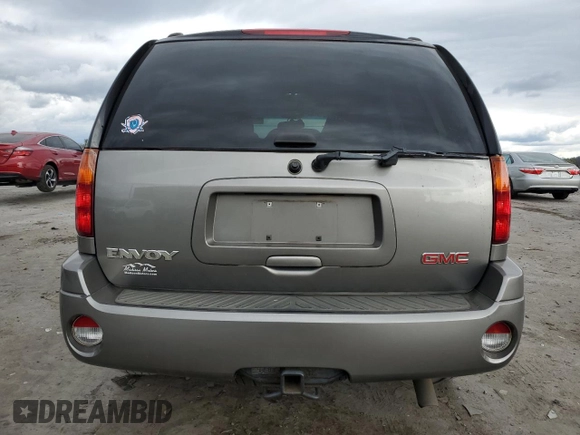 2005 GMC Envoy SLT with VIN 1GKDT13S952155528, listed as a Copart auction lot 76095784 with 212,458 mi miles and Clean Title. Bid and sale history available at DreamBid. Image 6.
