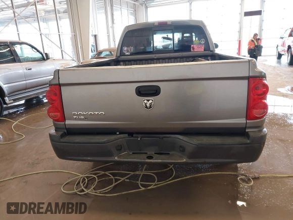 2005 Dodge Dakota ST with VIN 1D7HE22KX5S108948, listed as a IAAI auction lot 41588626 with 149,594 mi miles and . Bid and sale history available at DreamBid. Image 15.