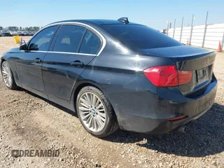 2014 BMW 3 Series 328d with VIN WBA3D3C55EK154125, listed as a IAAI auction lot 41651614 with 193,952 mi miles and . Bid and sale history available at carsss.com. Image 3.