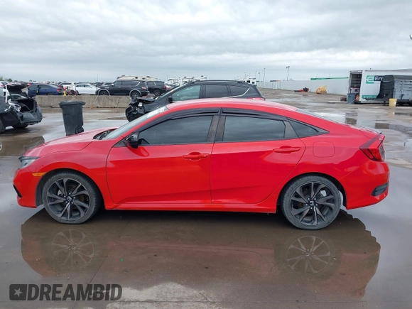2021 Honda Civic Sport with VIN 2HGFC2F80MH502407, listed as a IAAI auction lot 41949825 with 65,661 mi miles and . Bid and sale history available at DreamBid. Image 14.