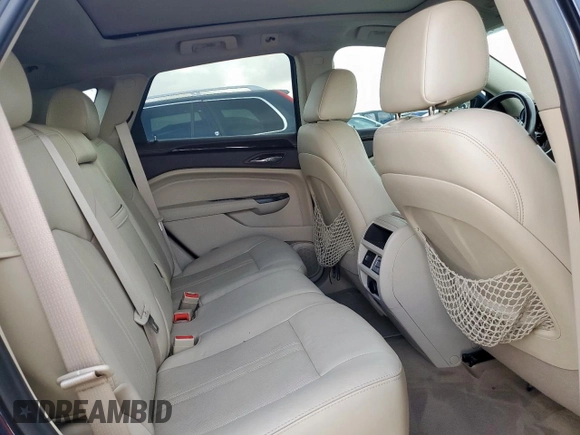 2016 Cadillac SRX Performance Collection with VIN 3GYFNCE32GS507625, listed as a Copart auction lot 61575625 with 47,427 mi miles and Salvage title. Bid and sale history available at DreamBid. Image 11.