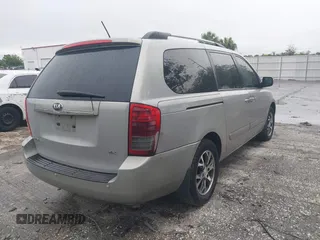 2014 Kia Sedona EX with VIN KNDMH4C74E6578326, listed as a IAAI auction lot 41990311 with 220,772 mi miles. Bid and sale history available at carsss.com. Image 4.