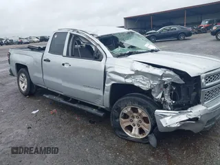 2014 Chevrolet Silverado 1500 LT with VIN 1GCRCREH4EZ395398, listed as a IAAI auction lot 42245009 with 201,552 mi miles and . Bid and sale history available at DreamBid. Image 6.