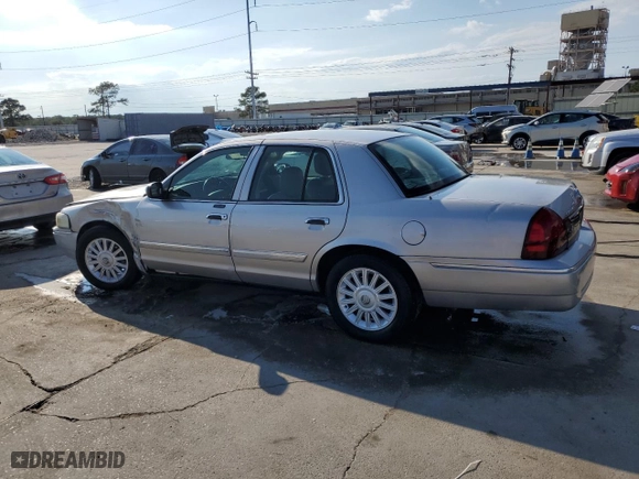 2010 Mercury Grand Marquis LS with VIN 2MEBM7FV0AX602472, listed as a Copart auction lot 72833864 with 73,376 mi miles and Salvage Title. Bid and sale history available at carsss.com. Image 2.
