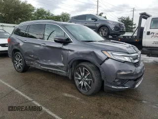 2020 Honda Pilot Touring 7-Passenger z VIN 5FNYF6H68LB052379, wystawiony jako Copart lot #57655775 z przebiegiem 73 501 mil mil oraz Szkoda całkowita • Salvage title. Historia ofert i sprzedaży dostępna na DreamBid. Obrazek 4.