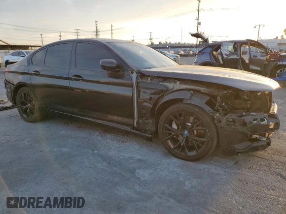 2023 BMW 5 Series 530e with VIN WBA13AG02PCN09018, listed as a Copart auction lot 85255124 with 34,015 mi miles and Clean title. Bid and sale history available at DreamBid. Image 4.