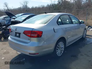 2015 Volkswagen Jetta SE with VIN 3VWD07AJ3FM242267, listed as a IAAI auction lot 41500978 with Not provided miles and . Bid and sale history available at DreamBid. Image 4.