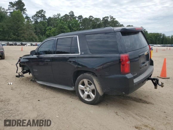 2015 Chevrolet Tahoe LS with VIN 1GNSCAKC5FR308614, listed as a Copart auction lot 60138355 with 145,797 mi miles and Salvage title. Bid and sale history available at DreamBid. Image 2.