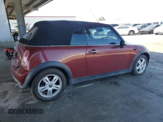 2007 MINI Convertible with VIN WMWRF33537TG17447, listed as a Copart auction lot 59015995 with 137,032 mi miles and Salvage title. Bid and sale history available at DreamBid. Image 3.