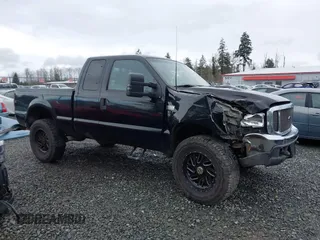 1999 Ford Super Duty F-250 XL with VIN 1FTNX21F2XEC99584, listed as a IAAI auction lot 41611098 with 424,263 mi miles. Bid and sale history available at carsss.com. Image 13.