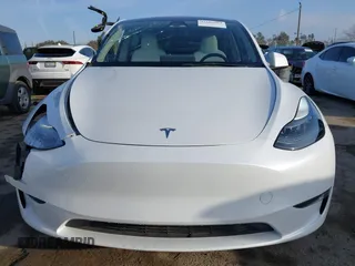 2023 Tesla Model Y Performance with VIN 7SAYGDEF0PF839468, listed as a IAAI auction lot 41609263 with 25,434 mi miles and . Bid and sale history available at DreamBid. Image 13.