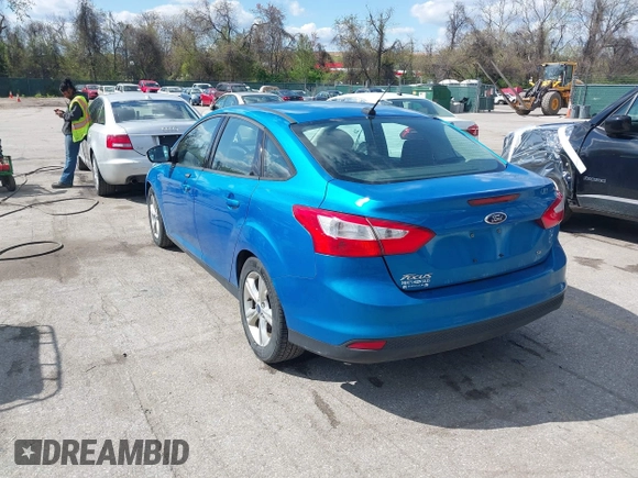 2014 Ford Focus SE with VIN 1FADP3F29EL160431, listed as a IAAI auction lot 42037212 with 112,607 mi miles. Bid and sale history available at carsss.com. Image 3.