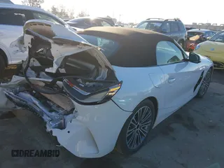 2023 BMW Z4 sDrive30i with VIN WBAHF3C00PWY17214, listed as a IAAI auction lot 41289705 with 3,412 mi miles. Bid and sale history available at carsss.com. Image 4.