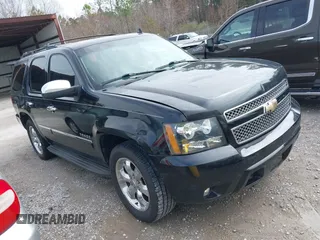 2011 Chevrolet Tahoe LTZ z VIN 1GNSCCE04BR248624, wystawiony jako IAAI lot #41584526 z przebiegiem 216 903 mil mil oraz . Historia ofert i sprzedaży dostępna na DreamBid. Obrazek 1.