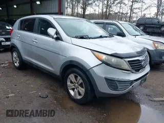 2012 Kia Sportage LX with VIN KNDPB3A27C7290386, listed as a IAAI auction lot 41634101 with 116,807 mi miles. Bid and sale history available at carsss.com. Image 1.