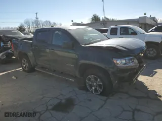 2015 Chevrolet Colorado 4WD Z71 with VIN 1GCGTCE3XF1251671, listed as a Copart auction lot 42787115 with 55,778 mi miles and Salvage Title. Bid and sale history available at carsss.com. Image 4.