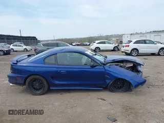 1996 Ford Mustang GT z VIN 1FALP42X6TF193224, wystawiony jako IAAI lot #42066891 z przebiegiem 42 705 mil mil oraz . Historia ofert i sprzedaży dostępna na DreamBid. Obrazek 14.