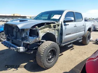 2021 Toyota Tacoma SR5 with VIN 3TMAZ5CN5MM156116, listed as a IAAI auction lot 42017208 with 34,410 mi miles and . Bid and sale history available at DreamBid. Image 18.