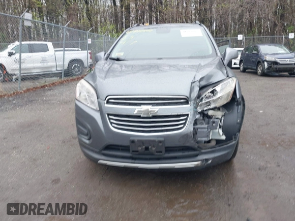 2015 Chevrolet Trax LT with VIN KL7CJRSBXFB097960, listed as a IAAI auction lot 41976883 with 98,621 mi miles and . Bid and sale history available at carsss.com. Image 12.