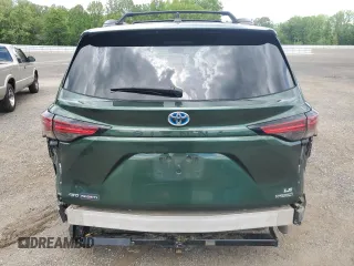 2021 Toyota Sienna LE with VIN 5TDBSKFC4MS027897, listed as a Copart auction lot 56052375 with 66,604 mi miles and Salvage title. Bid and sale history available at DreamBid. Image 6.