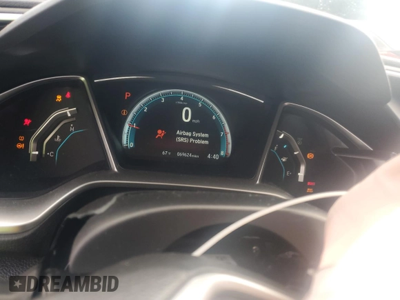 2018 Honda Civic EX with VIN 2HGFC2F74JH530701, listed as a Copart auction lot 74676554 with 69,624 mi miles and Salvage Title. Bid and sale history available at DreamBid. Image 9.