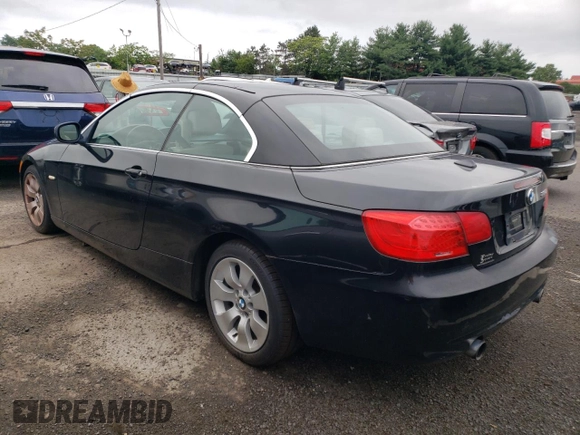2012 BMW 3 Series 335i with VIN WBADX7C5XCE744190, listed as a Copart auction lot 63581925 with 103,834 mi miles and Clean title. Bid and sale history available at DreamBid. Image 2.