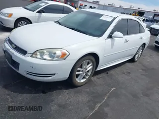 2013 Chevrolet Impala LTZ with VIN 2G1WC5E38D1258965, listed as a IAAI auction lot 42001465 with 139,929 mi miles and . Bid and sale history available at DreamBid. Image 2.
