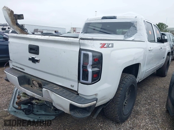 2018 Chevrolet Silverado 1500 LT with VIN 3GCUKREC9JG453405, listed as a IAAI auction lot 41580161 with 172,578 mi miles. Bid and sale history available at carsss.com. Image 4.